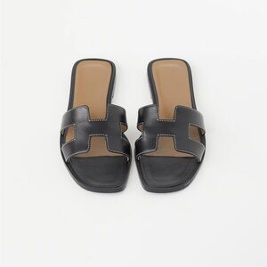 Hermes Oran black sandal slide